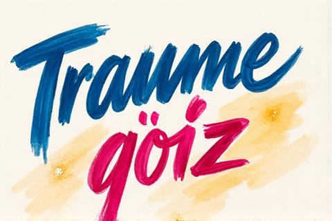Dynamisches Brush-Lettering eines inspirierenden Zitats mit hellen Aquarellfarben auf strukturiertem Papier